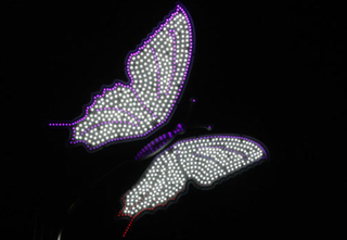 Illustration for article titled Friendly Dragonfly Streetlamp Helps You Forget Big Bro Is Watching
